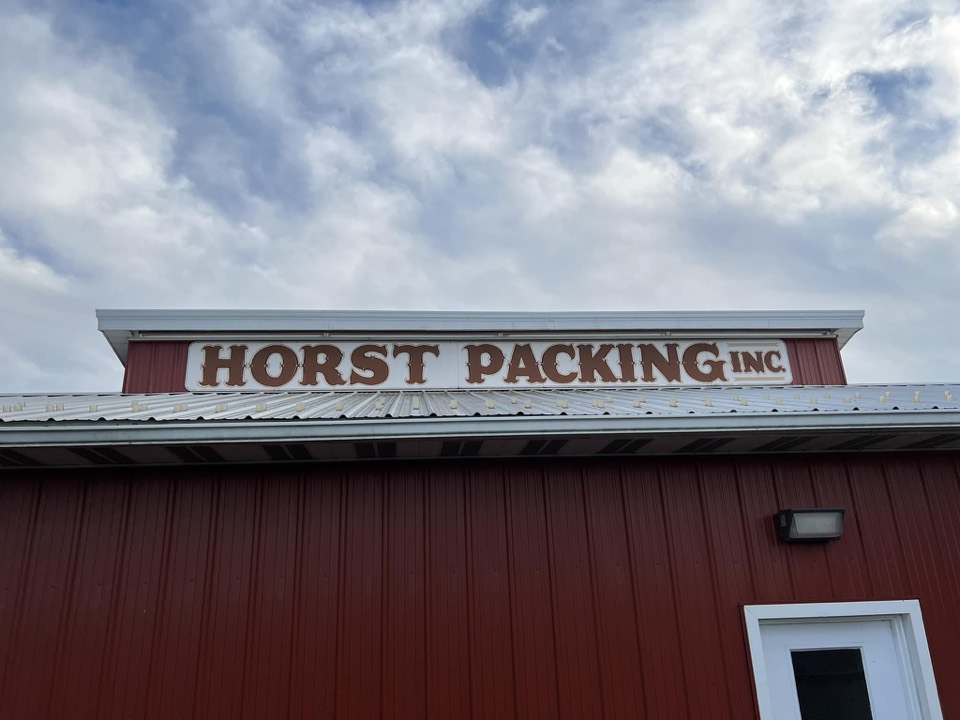 The Horst Packing Inc. sign above our red shop building